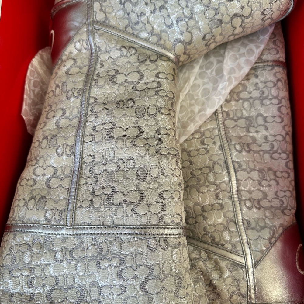 Coach silver and white boots  size 7 woman’s
